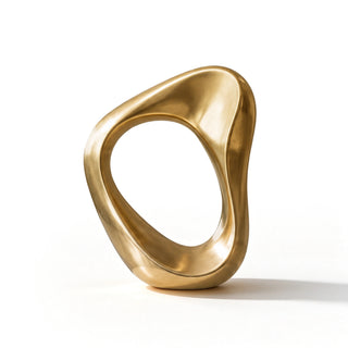 Abstract bronze loop sculpture with minimalist organic shape and polished metallic golden finish