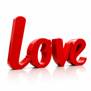 Custom stainless steel LOVE sculpture with red finish installed as a city park landmark and public art attraction.