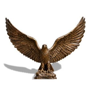 Handcrafted bronze bald eagle statue featuring detailed feathers and open wings for luxury garden and outdoor spaces