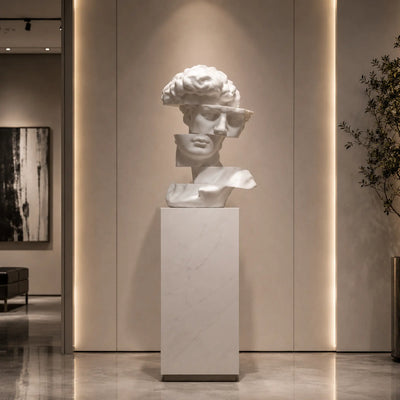 David marble bust sculpture displayed as a contemporary masterpiece in a modern art gallery