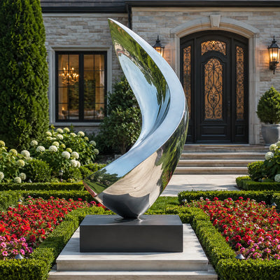 Mirror polished stainless steel flame sculpture with elegant flowing curves for modern outdoor landscapes