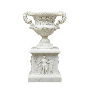 White marble garden urn featuring carved stone details. Hand-Carved Flowerpot for luxury gardens décor. 