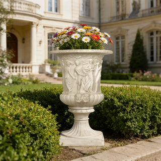 Hand carved marble mythology urn planter with Greek relief figures for garden and villa decor