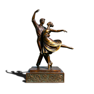Indoor and outdoor bronze couple figurine displayed in modern home and garden décor
