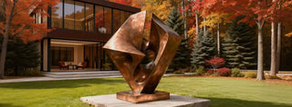 a large contemporary abstract bronze sculpture in a corporate atrium