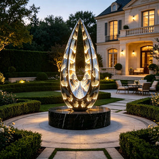 VICTORY VSS-82 Illuminated stainless steel leaf sculpture installed in an urban office plaza