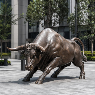 Large bronze charging bull statue handcrafted for business plaza outdoor landscape and corporate headquarters