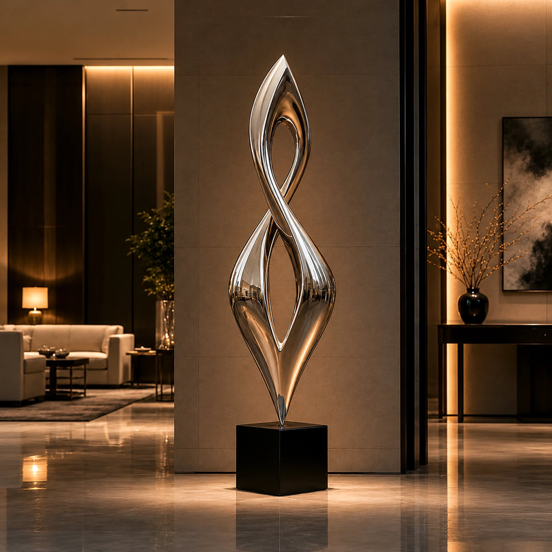 Contemporary abstract twist stainless steel sculpture installed in a luxury interior space for premium decor