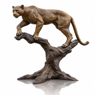 Realistic bronze cougar statue walking on a  tree branch, muscular body, curved tail, and antique brown bronze finish
