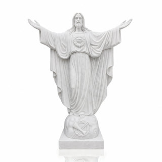 Outdoor marble Sacred Heart of Jesus statue installed in a church landscape with premium white marble finish