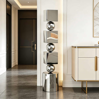 Polished stainless steel abstract geometric sculpture with stacked cubes and spheres for modern living room