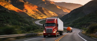 A large custom sculpture is securely crated and loaded for international delivery