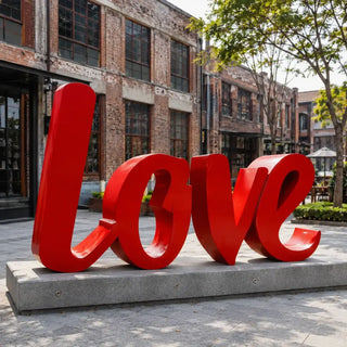 Modern red stainless steel LOVE sculpture designed for parks, plazas, and urban landscapes.