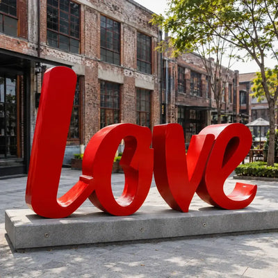 Modern red stainless steel LOVE sculpture designed for parks, plazas, and urban landscapes.