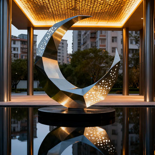 Matte Polished stainless steel crescent moon sculpture with modern geometric design for hotel lobby décor.