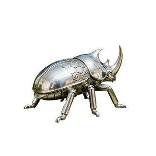 Modern stainless steel rhinoceros beetle sculpture with polished finish, contemporary insect.