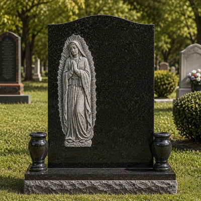 Virgin Mary black marble headstone featuring Our Lady of Guadalupe as a custom Catholic cemetery memorial