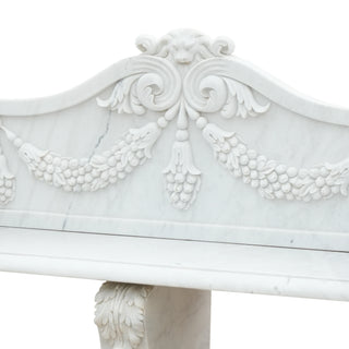 marble bench sculpture installed as a functional art centerpiece in European manor garden landscape